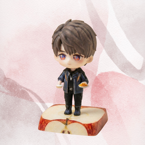 Figurine of Love and Deepspace's Caleb on top of a half apple platform. 